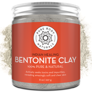 A jar labeled "Bentonite Indian Healing Clay, 100% Pure" with an orange background. The text highlights that it is 100% pure and natural, actively seeks toxins and impurities, and reveals soft, clear skin. The jar contains 8 oz (227 g) of the product.