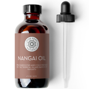 A dark brown bottle labeled "Nangai Oil, 4 fl oz" from Pure Body Naturals, with a dropper placed beside it. The label mentions it is wild harvested and cold pressed on the tropical island nation of Vanuatu. The bottle contains 4 fl oz (118 ml) of the product.